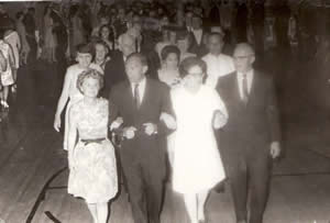 black and white photo of people at a dance